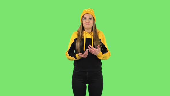 Modern Girl in Yellow Hat in Anticipation of Worries, Then Guilty Hides His Eyes. Green Screen