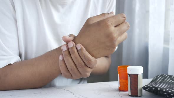 Man Suffering Pain in Hand Close Up