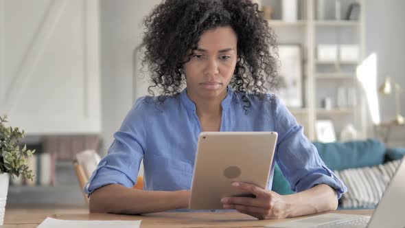 African Woman Using Tablet