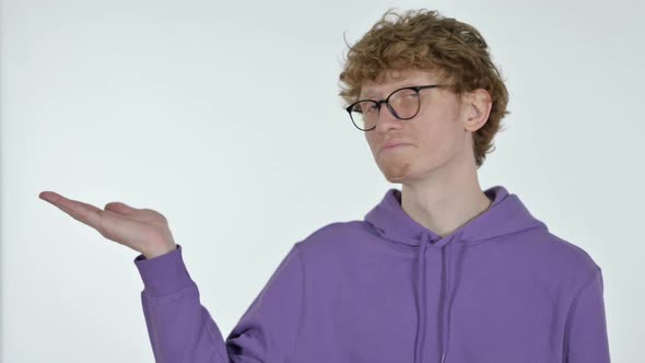 Copy Space Redhead Young Man Showing Product on Hand White Background