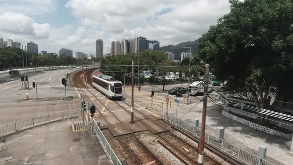 An aerial view of light train. Light rail system operated by MTR Corporation, serving Tuen Mun, Yuen