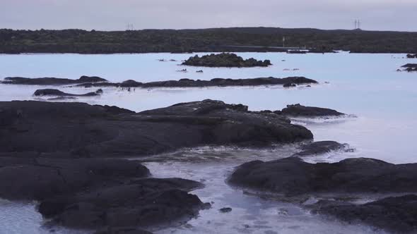 Scenery of sea bay with rocks in sunset