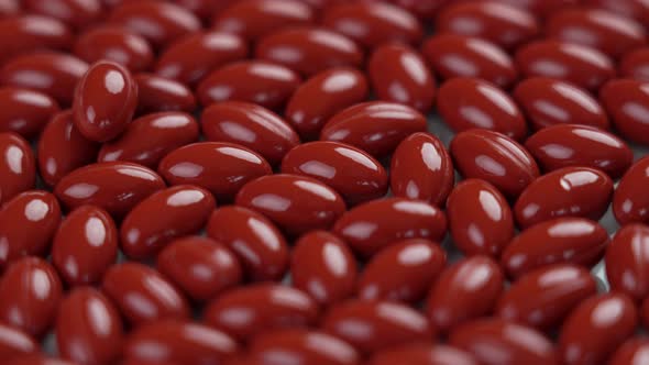Brown pills of vitamin A close-up. Rotation. Macro