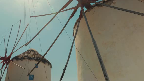 POV Shot Featuring Traditional Windmills in Mykonos