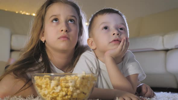 Cute Little Kids While Watching TV