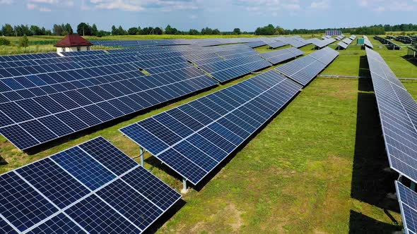 Aerial view. Top view on blue solar pannels. Green energy. Ecology and environment.