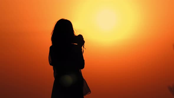 Female Photographing Outdoors