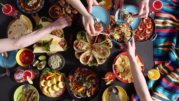 An Authentic Mexican Family Celebrates Cinco De Mayo Together at a Festive Table