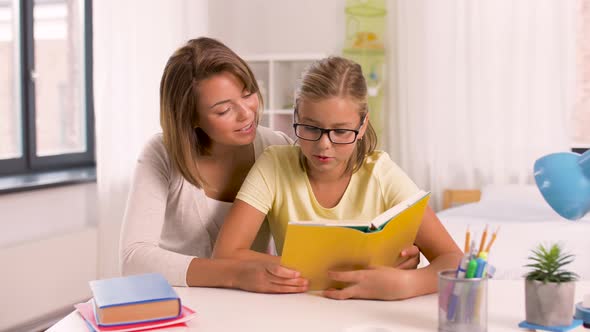 Mother and Daughter Doing Homework Together 11