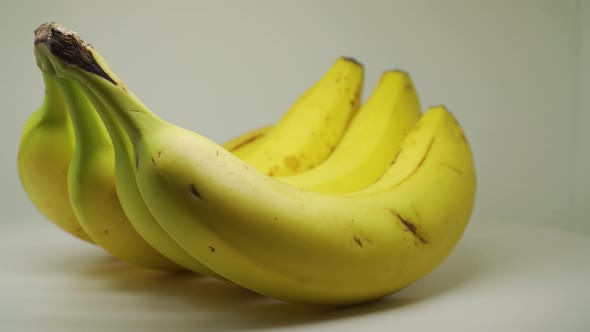 Four Banana In A Turntable Looks Fresh And Delicious - Close Up Shot