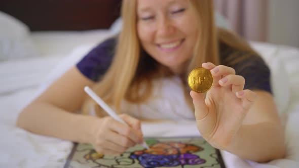 Woman Digital Artist Contemporary Painter Hold an NFT Coin in Her Hand