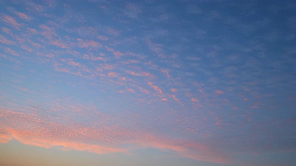 4K : Time lapse of colorful sky during beautiful sunset.  Romantic clouds.