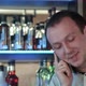 Happy Barman in Apron Calling on Smartphone at Bar - VideoHive Item for Sale