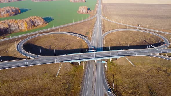 Aerial Drone View of Highway Multilevel Junction Road with Moving Cars