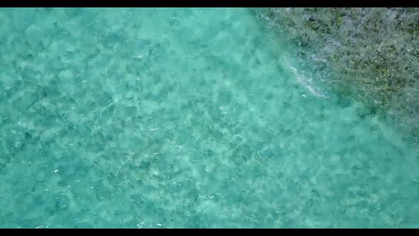 Aerial top view landscape of beautiful coast beach vacation by blue green sea with white sand backgr