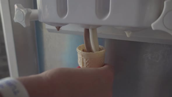 Ice Cream In Cone. Ice Cream In Waffle Cup Slow Motion. Filling Wafer Cup Ice Cream.