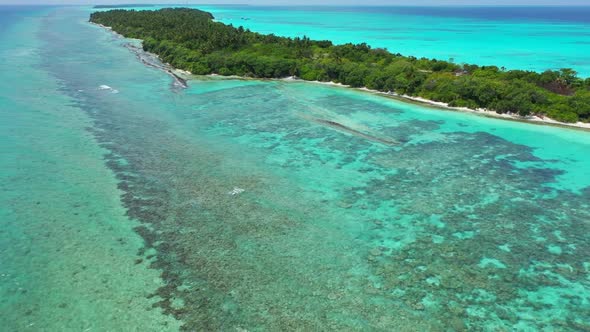 Aerial sky of luxury coast beach adventure by aqua blue ocean with white sand background of a dayout