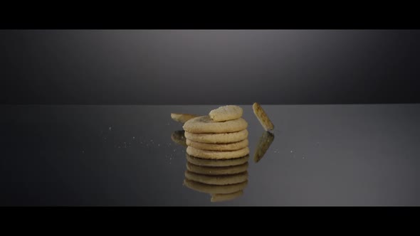 Falling cookies from above onto a reflective surface - COOKIES 186