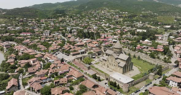 Flying Over Svetitskhoveli Cathedral In The Historic Town Of Mtskheta, Georgia. Aerial Drone Shot