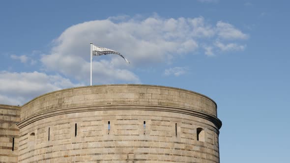 Bretagne flag  in Nantes on the castle tower 4K 2160p 30fps UltraHD footage - Symbol of Brittany in 