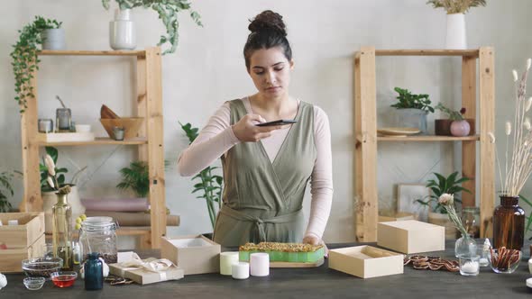 Woman Taking Photos Of Handmade Soap