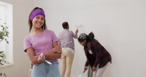 Renovation of Apartment a Smiling Girl in a Purple Blouse and Headband Looks at the Camera Proudly