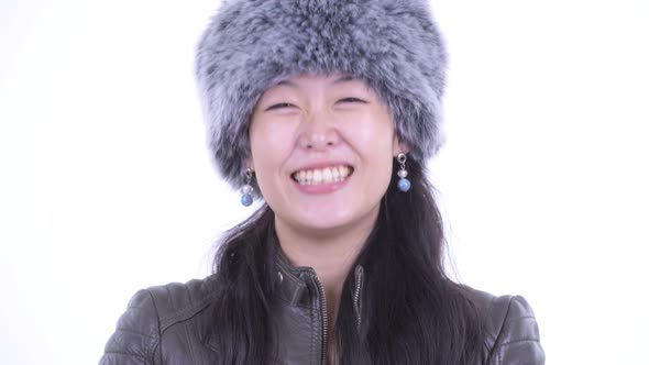 Face of Happy Beautiful Asian Woman Nodding Head Yes