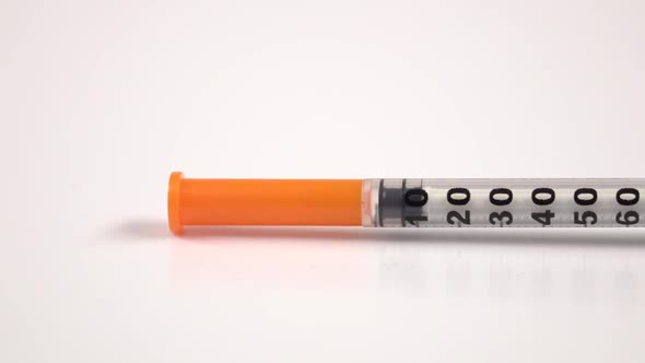 Insulin Syringe on White, Close Up