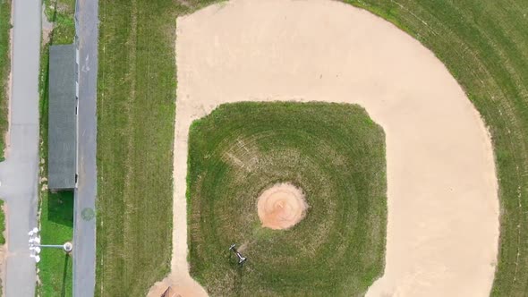 An empty baseball court near the school. Aerial high angle view