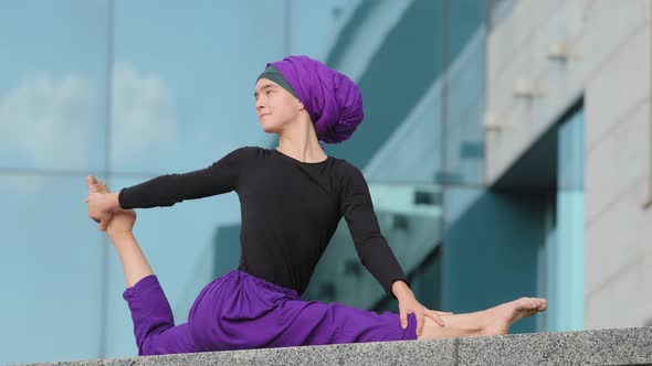 Muslim Islamic Arabian Indian Woman in Hijab Doing Yoga Workout Training Strength Practicing Effort