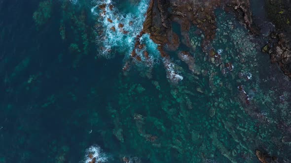 Top View of the Surface of the Atlantic Ocean with Rocks Protruding From the Water Off the Coast of