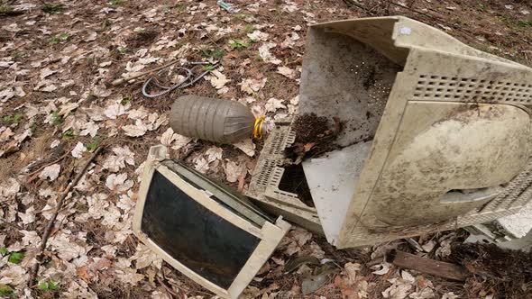 Old Computer in a Junkyard in the Forest Slow Motion