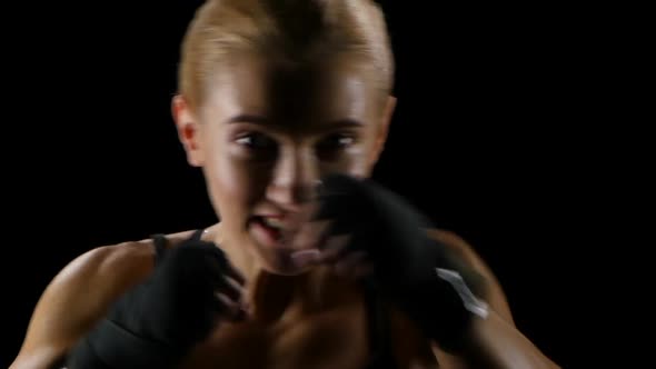 Aggressive Girl Boxer Training. Close Up