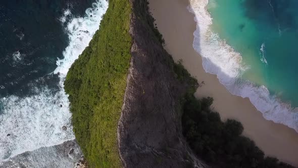 1 million $ drone aerial view flight very high bird's eye view of instagramKelingking Beach at Nusa