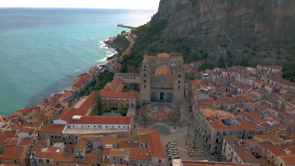 Cefalu Sicily Sunset at the Beach of Cefalu Sicilia Italy Mid Age Men and Woman on Vacation Sicily