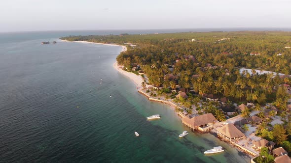 Aerial View Tropical Coastline Exotic Hotels and Palm Trees By Ocean Zanzibar