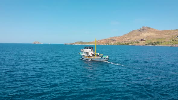 A Small Fishing Boat Goes To the Open Sea To Search for and Catch Salmon.