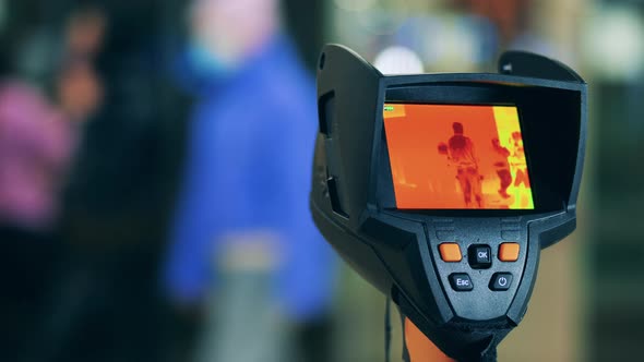 Walking People Are Getting Scanned By an Infrared Camera