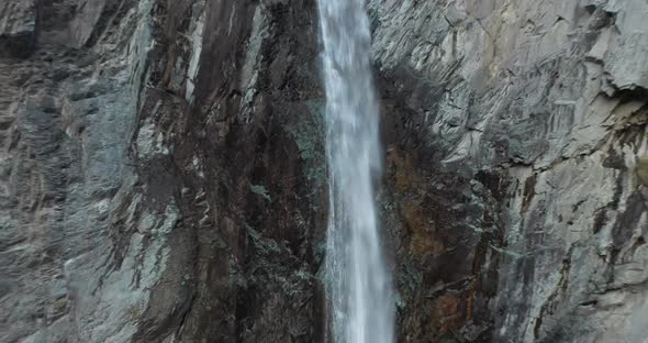 Bear Creek Falls in Ouray Colorado along the Million Dollar Highway. Drone video pulling out.