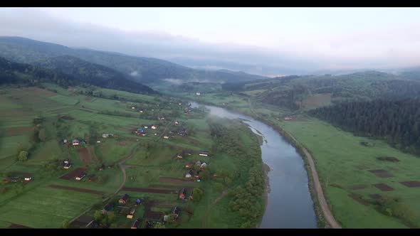 Flying High Above the River. Aerial View