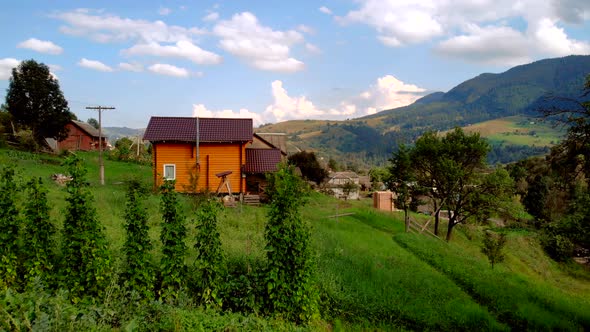 Wooden House in the Carpathian Mountains on a Hillside