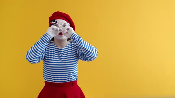 Cute Curious Mime Woman Shows How She Looks Through Binoculars I Look Behind Him Towards the Camera