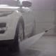 Car Washing at Selfservice Station Hose for Spraying Water in a Garage - VideoHive Item for Sale