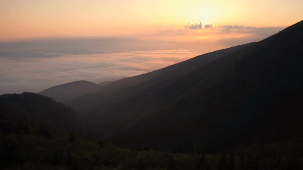 Aerial view of hills at sunset