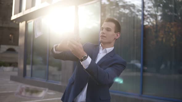 Rich Caucasian Businessman Throw Handful of Banknotes in the Air