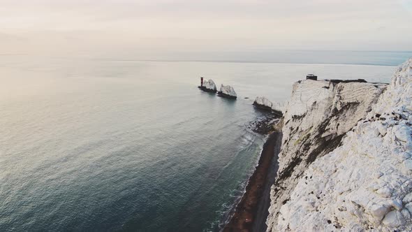 Aerial Drone Shot of Beautiful UK Coastal Scenery and Lighthouse, Isle of Wight, The Needles Chalk C