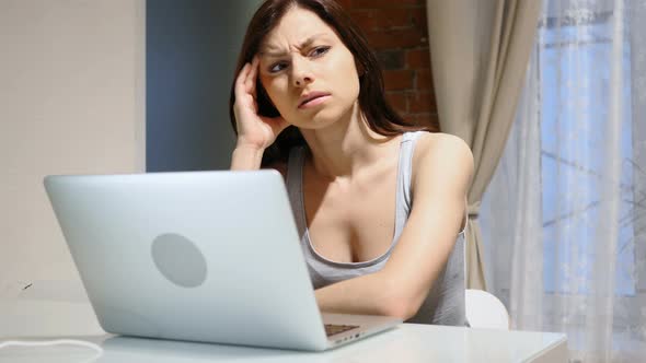 Pensive Thinking Woman Working on Laptop, Sitting on Stairs