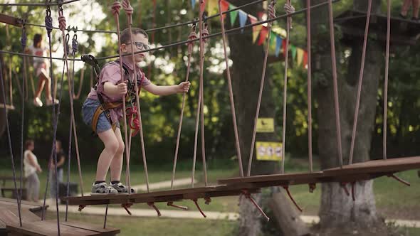 Little Boy on a Rope Bridge