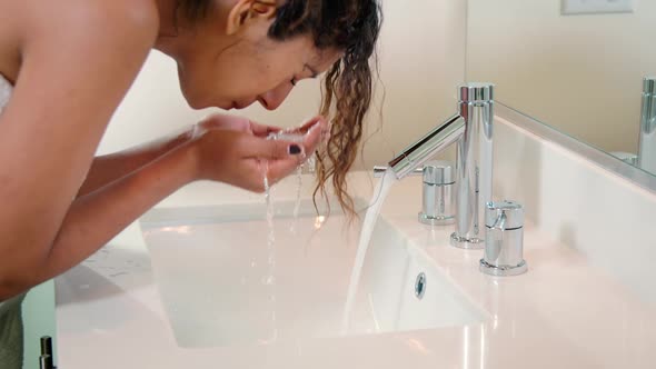 Woman Washing Face Slow Motion