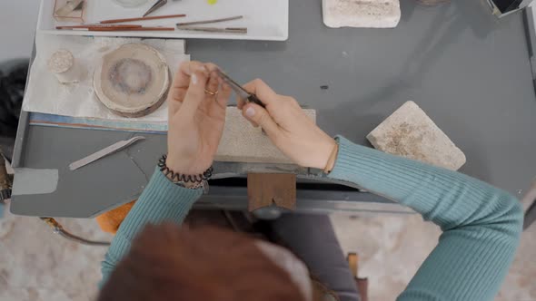 Overhead Shot Of Young Creative Woman On Her Working Table Making Pet Accessories With Artisanal